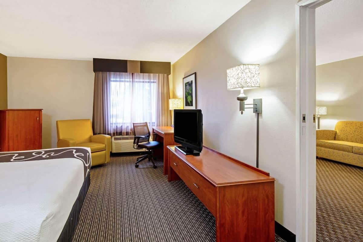 Premium bedding, blackout curtains, iron/ironing board