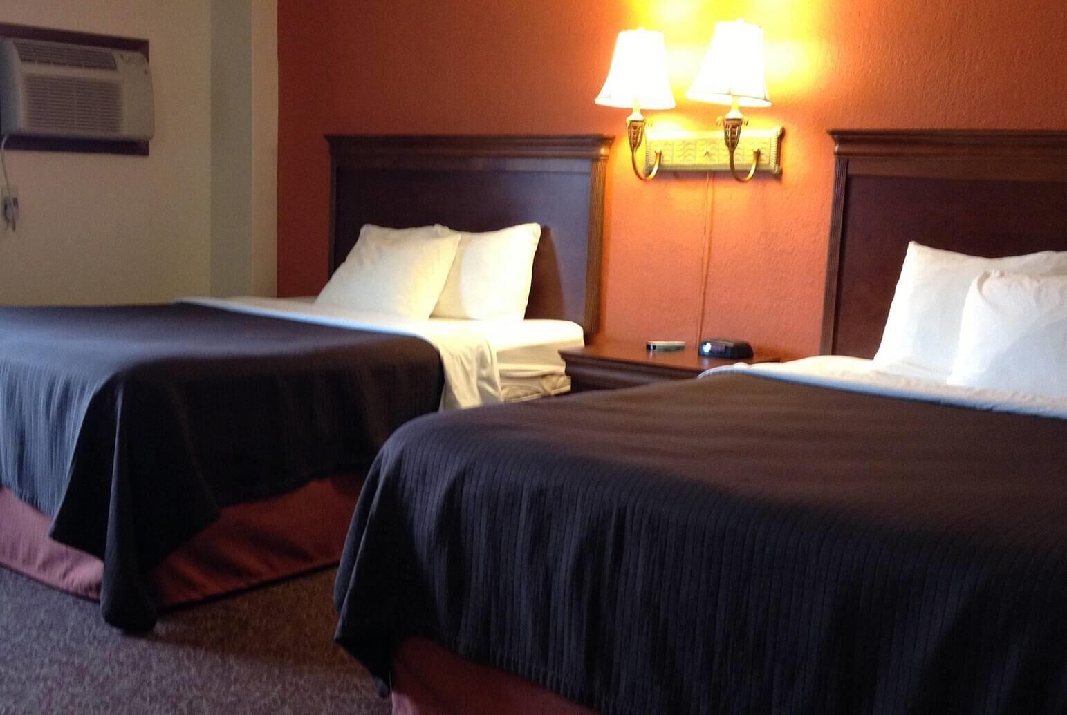 Desk, laptop workspace, iron/ironing board, free cots/infant beds