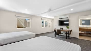 Deluxe Room, 2 Queen Beds, Courtyard Area | Desk, iron/ironing board, free WiFi, bed sheets