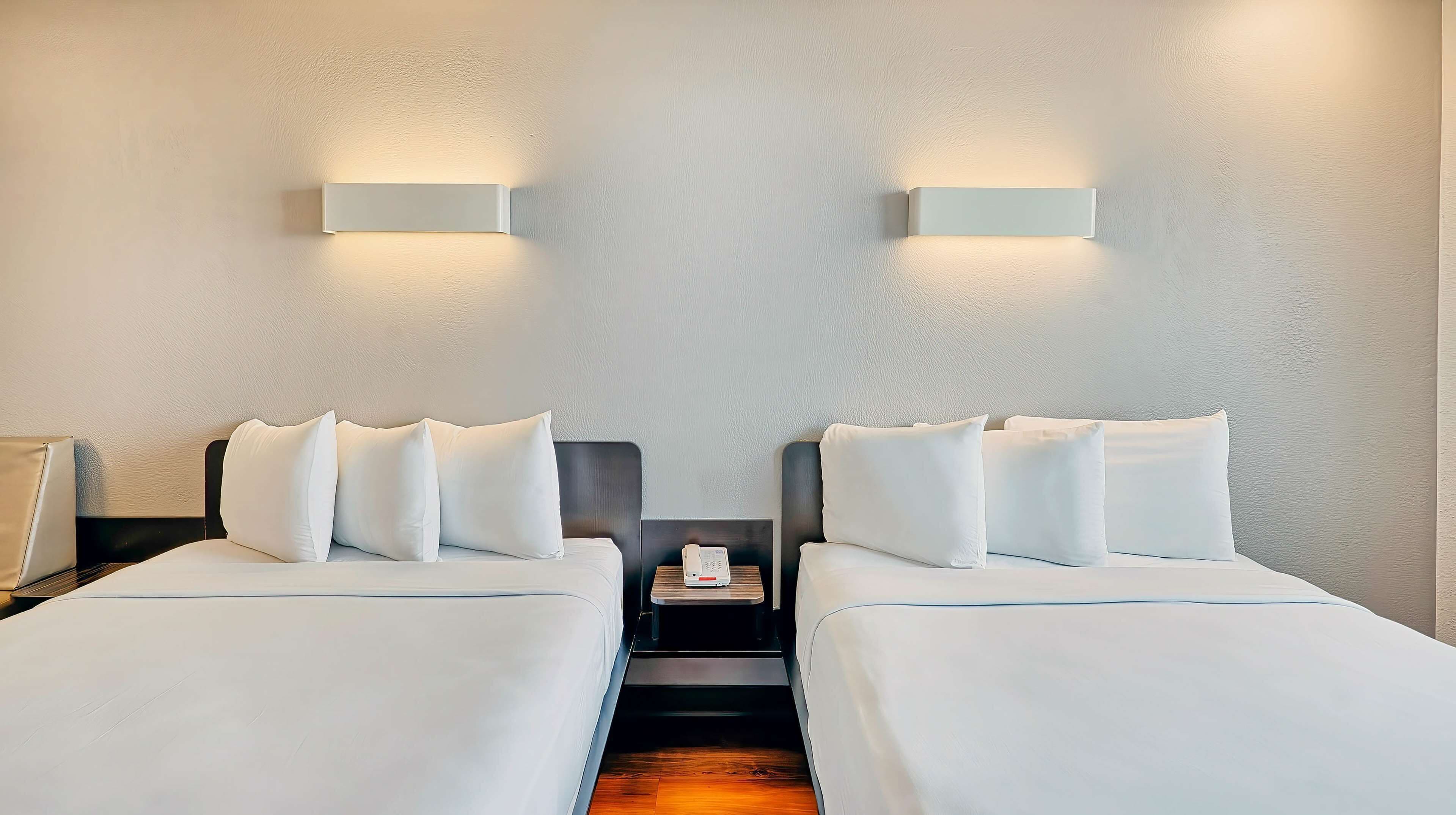 Desk, laptop workspace, free WiFi, bed sheets