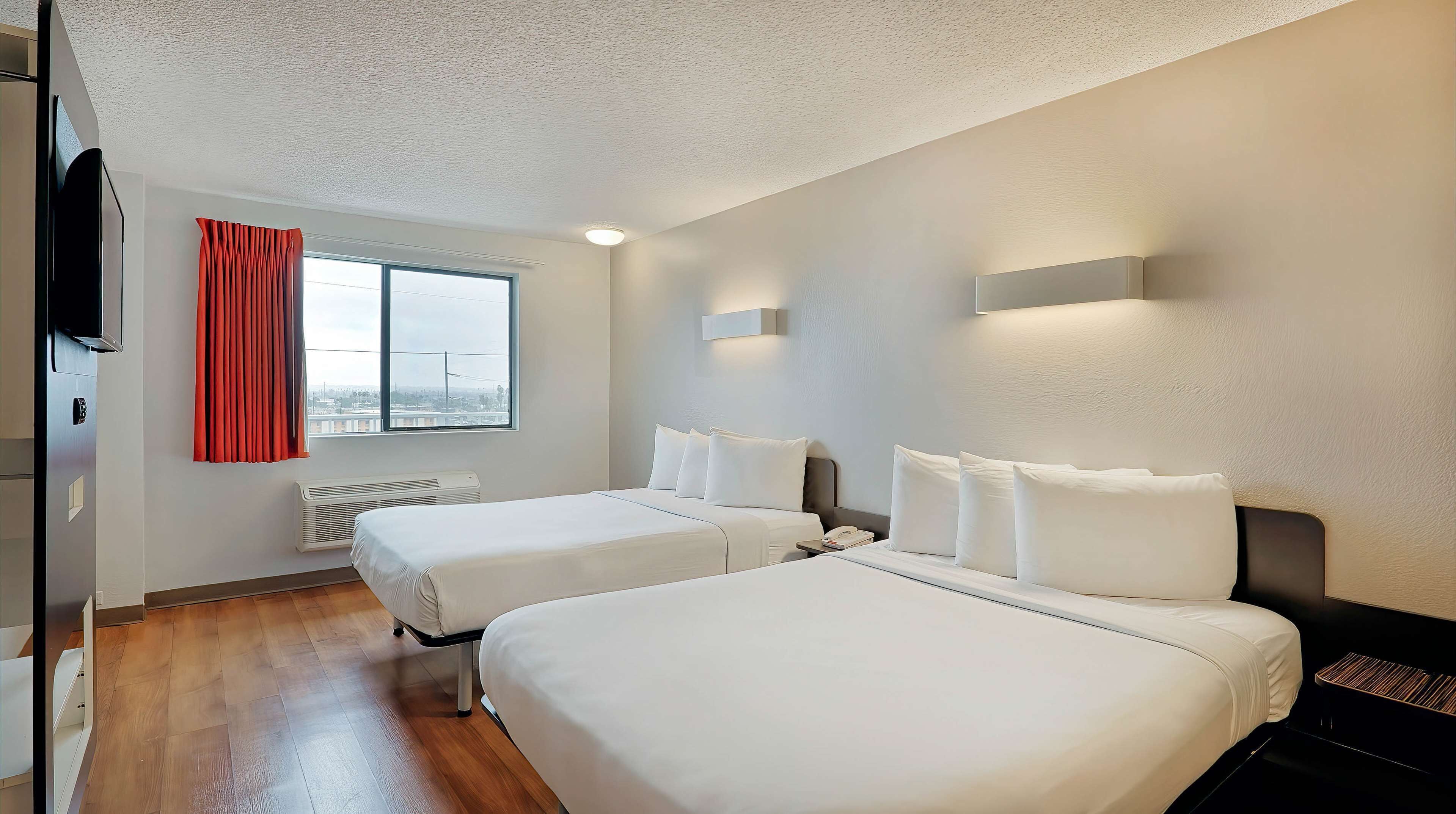 Desk, laptop workspace, free WiFi, bed sheets