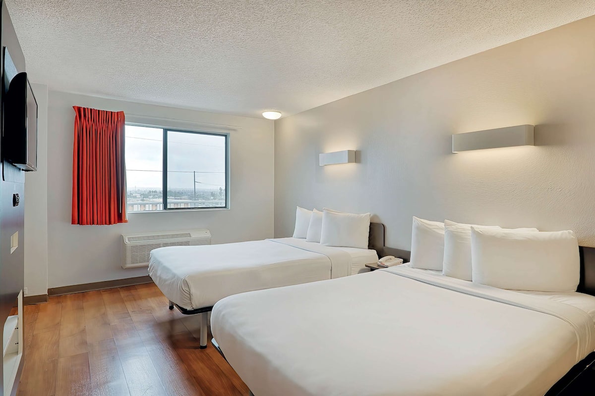 Desk, laptop workspace, free WiFi, bed sheets