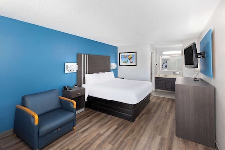 Room, 1 King Bed, Non Smoking | Pillowtop beds, desk, iron/ironing board, free cribs/infant beds