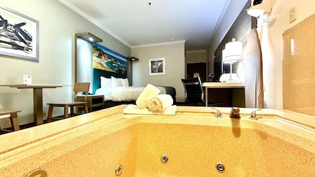 Deluxe Room, 1 King Bed, In-Room Jetted Tub, Non Smoking | In-room safe, desk, laptop workspace, blackout drapes. Quality Inn & Suites Los Angeles Airport - Stadium District