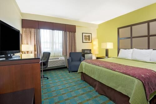 Pillowtop beds, desk, blackout drapes, iron/ironing board