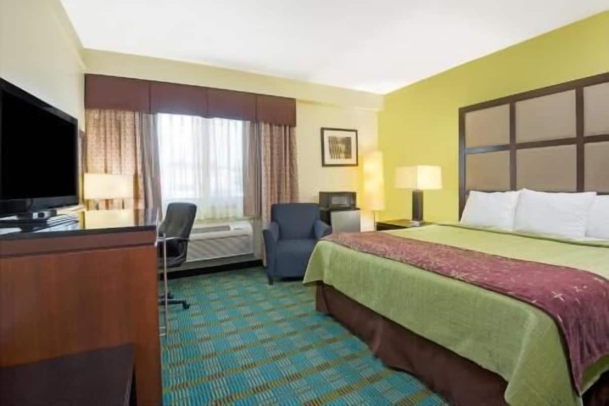 Pillowtop beds, desk, blackout drapes, iron/ironing board