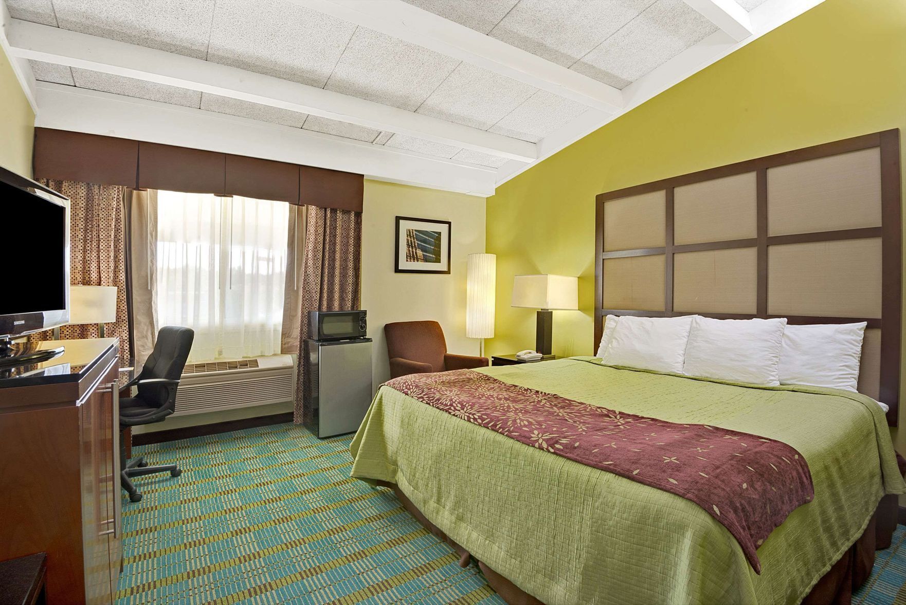 Pillowtop beds, desk, blackout drapes, iron/ironing board