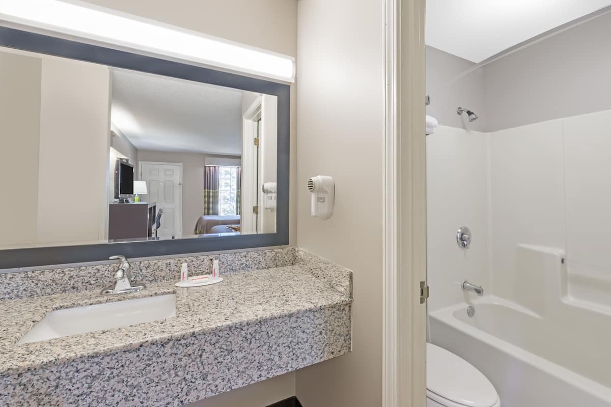 Room, 2 Double Beds, Non Smoking | Bathroom | Combined shower/bathtub, deep-soaking bathtub, free toiletries