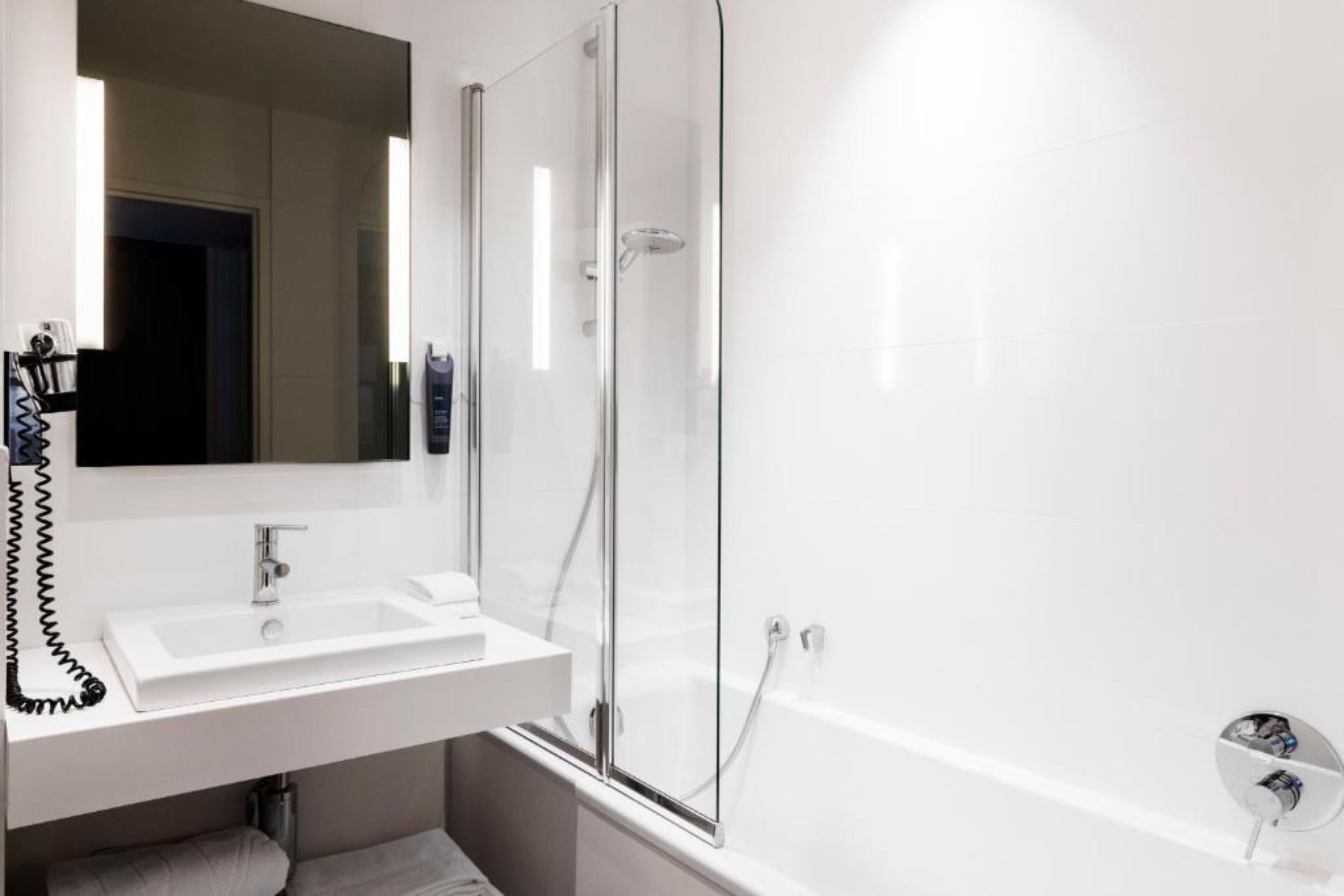 superior room, ocean view | bathroom | hair dryer, towels, soap, shampoo