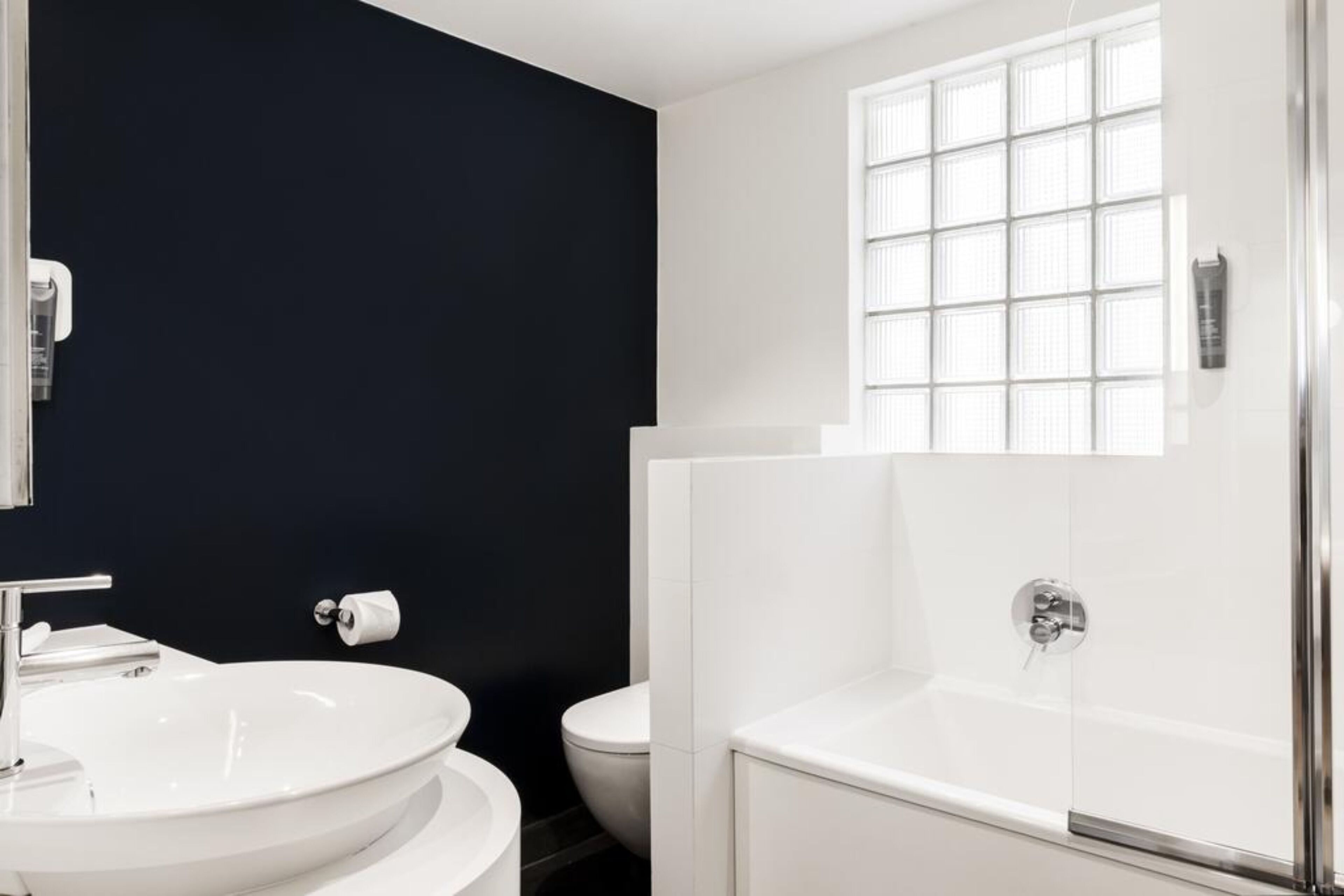 superior room, city view | bathroom | hair dryer, towels, soap, shampoo