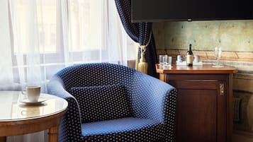 Camera singola | Biancheria da letto ipoallergenica, minibar, una cassaforte in camera