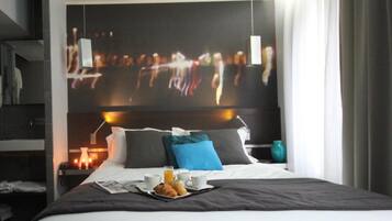 Luxe beddengoed, een kluis op de kamer, individueel gedecoreerd