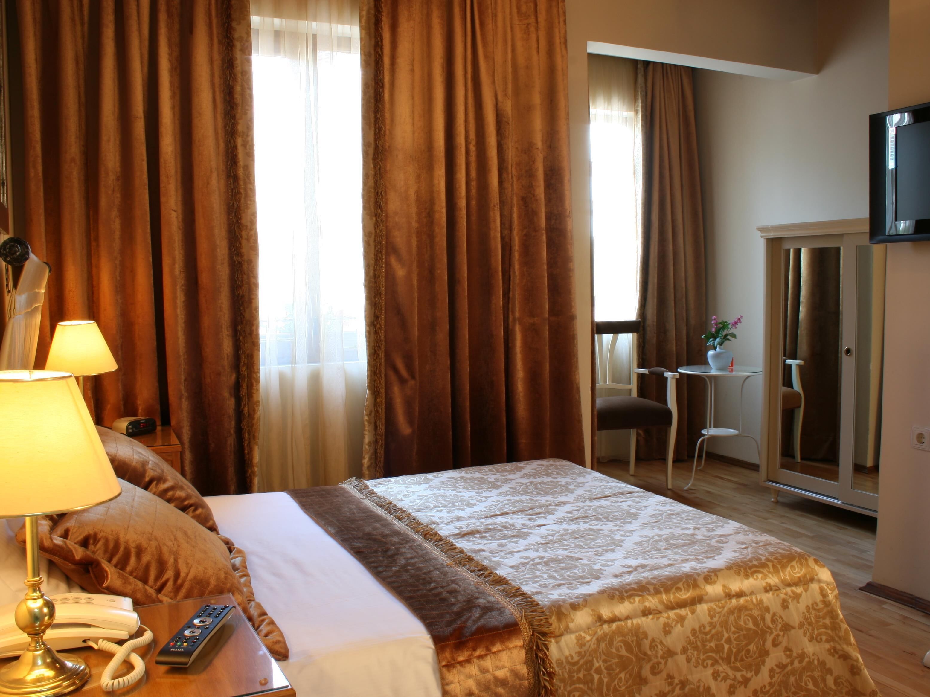 Premium bedding, down comforters, Select Comfort beds, minibar