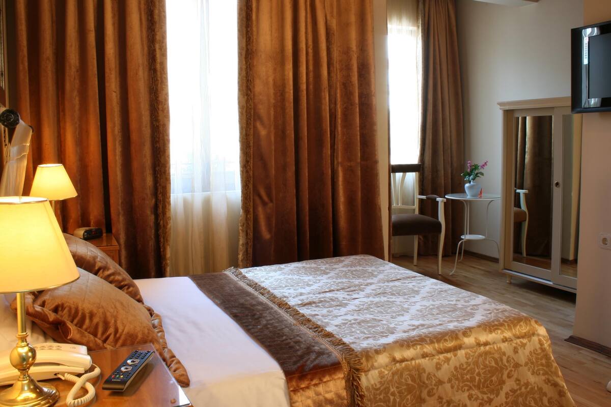 Premium bedding, down comforters, Select Comfort beds, minibar