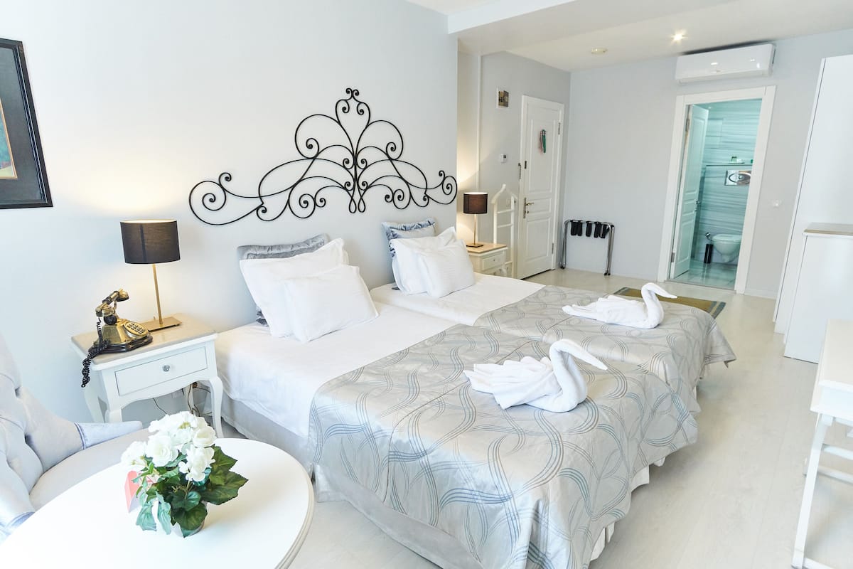 Premium bedding, down duvets, Select Comfort beds, minibar