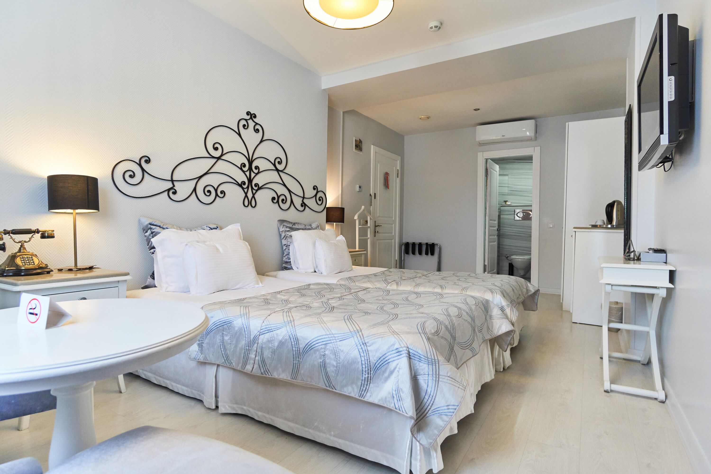 Premium bedding, down comforters, Select Comfort beds, minibar