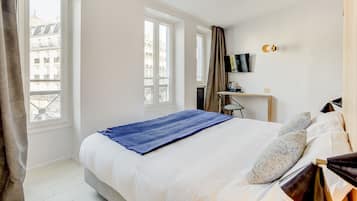 Ropa de cama de alta calidad y minibar