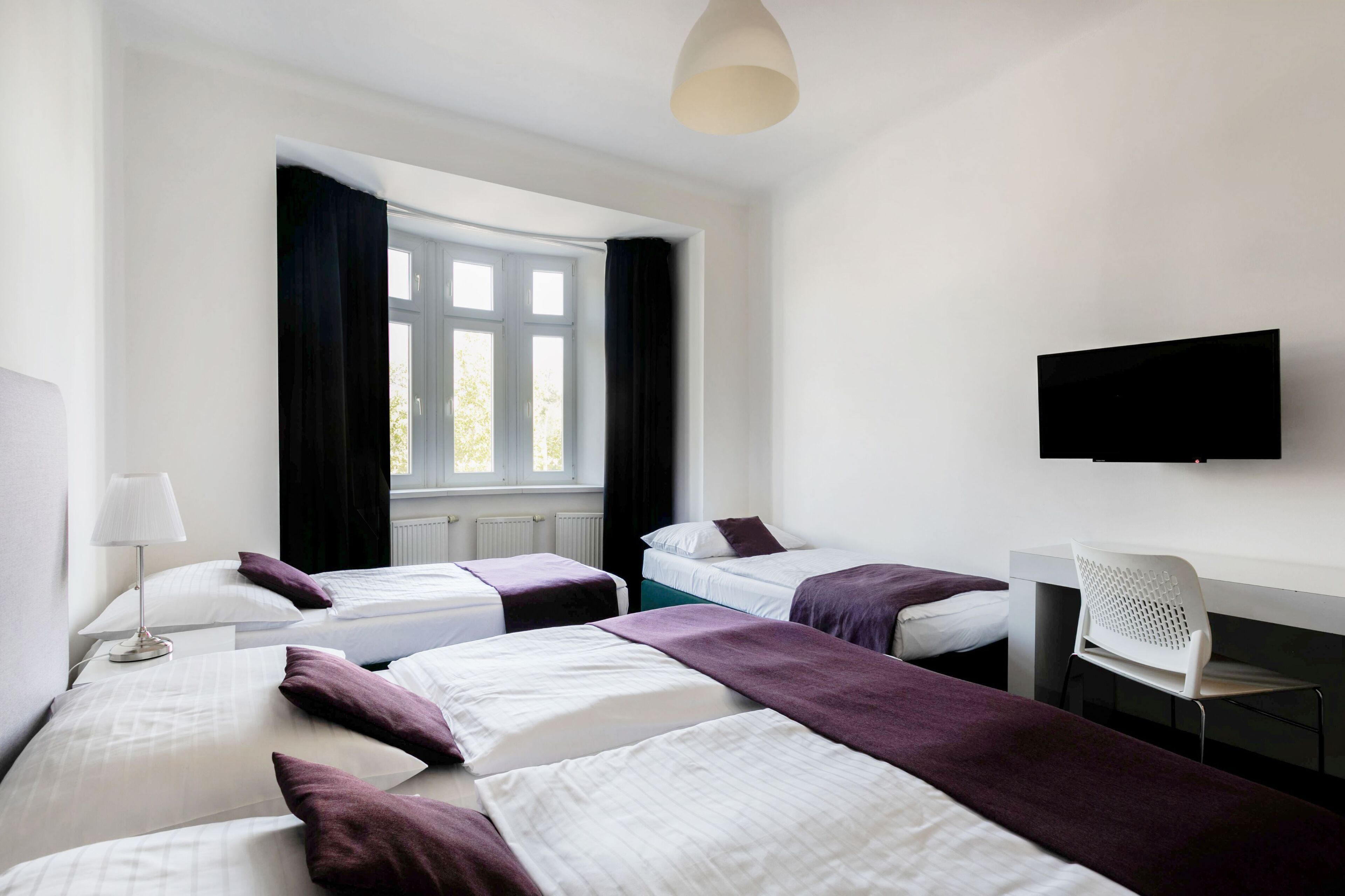 quadruple room | 1 bedroom, in-room safe, desk, blackout curtains