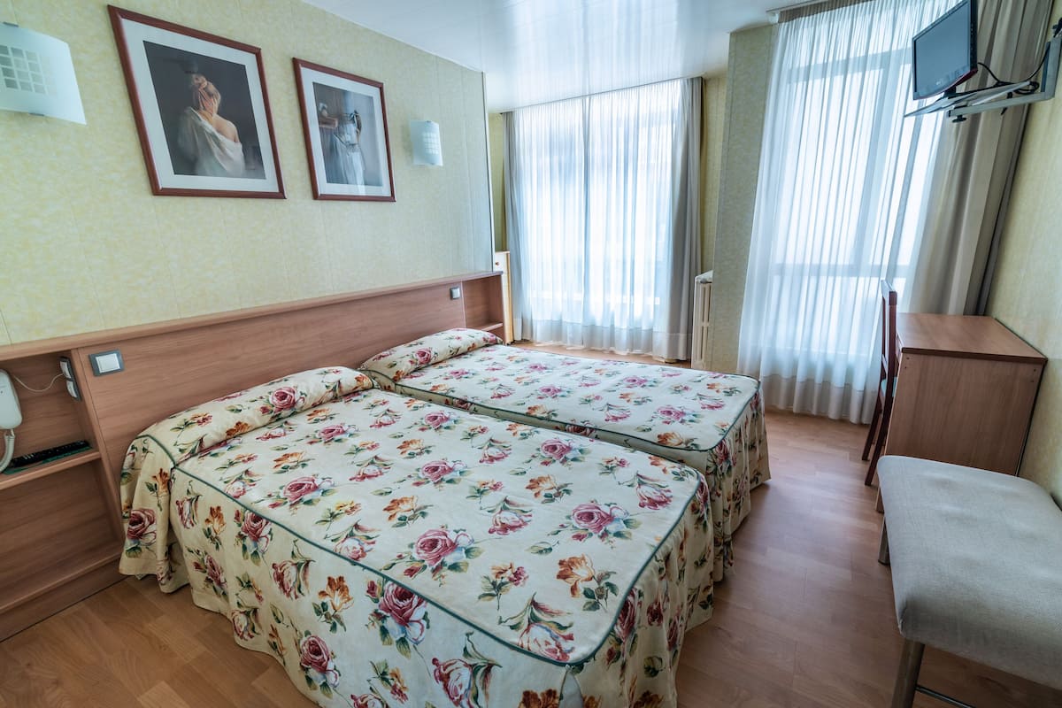 desk, blackout curtains, free wifi, bed sheets