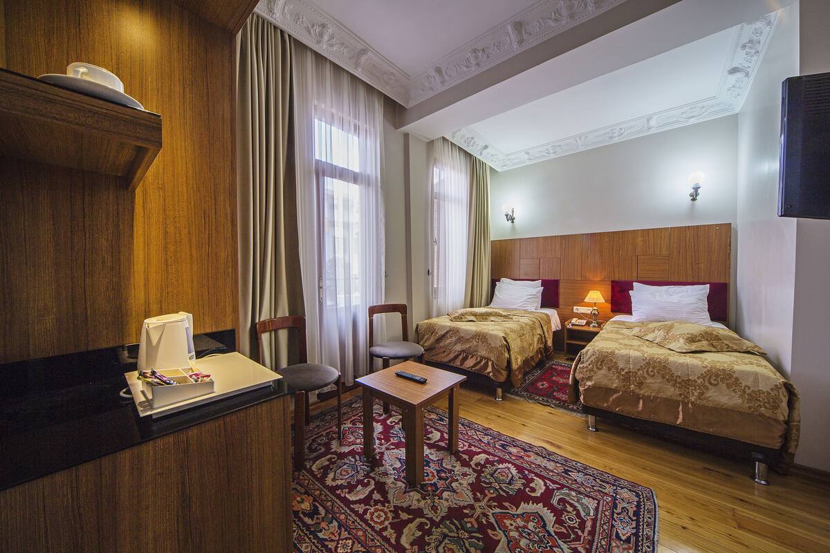 Premium bedding, down comforters, minibar, in-room safe