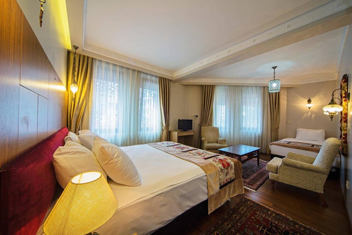 Family Room | Premium bedding, down comforters, minibar, in-room safe