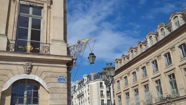 A historic building with ornate balconies and classical architecture. - Hôtel du Triangle d'Or (Paris)
