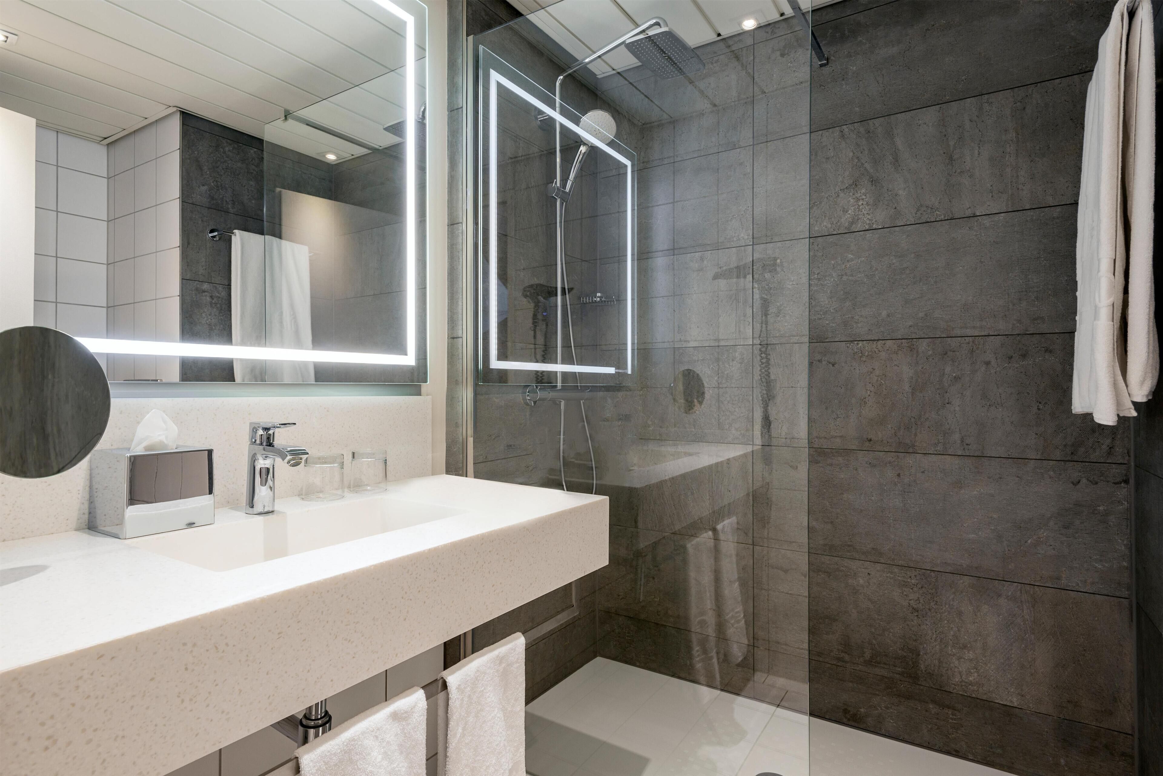shower, deep-soaking bathtub, rainfall showerhead