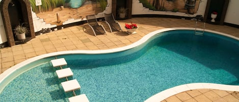 Seasonal outdoor pool, sun loungers