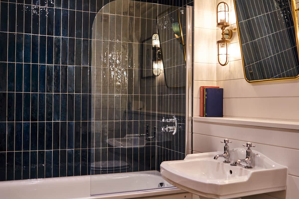 separate bathtub and shower, deep-soaking bathtub, rainfall showerhead