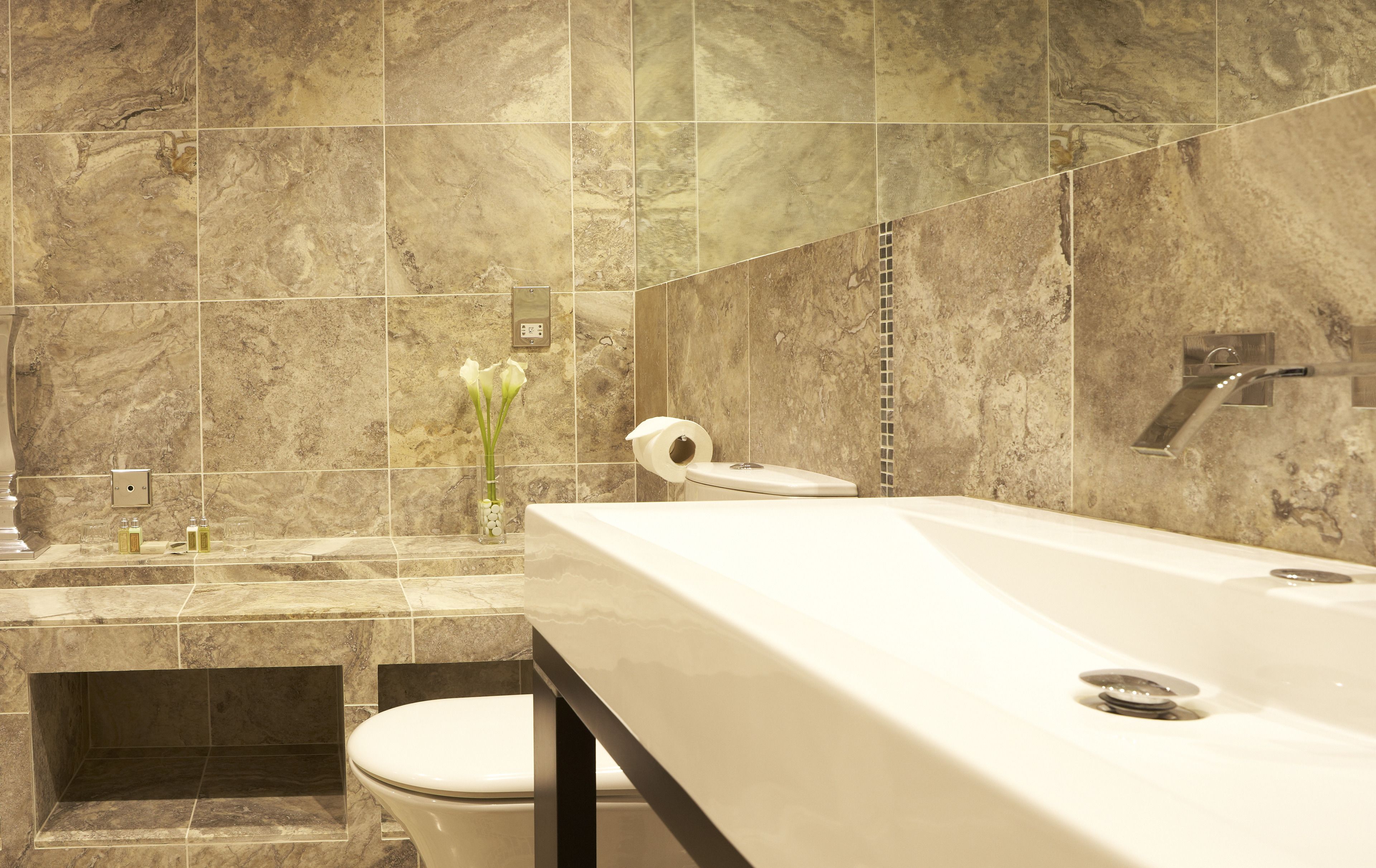 deluxe double room | bathroom | designer toiletries, hair dryer, towels