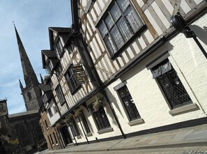 A traditional half-timbered building with a sign for 'Prince Regent Hotel'. - Prince Rupert Hotel (Shrewsbury)