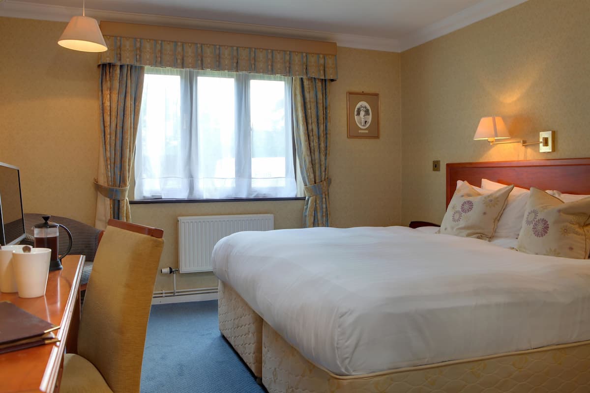 In-room safe, desk, blackout curtains, iron/ironing board
