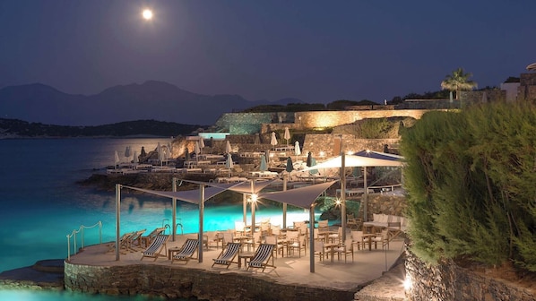 3 bars/lounges, poolside bar, beach bar