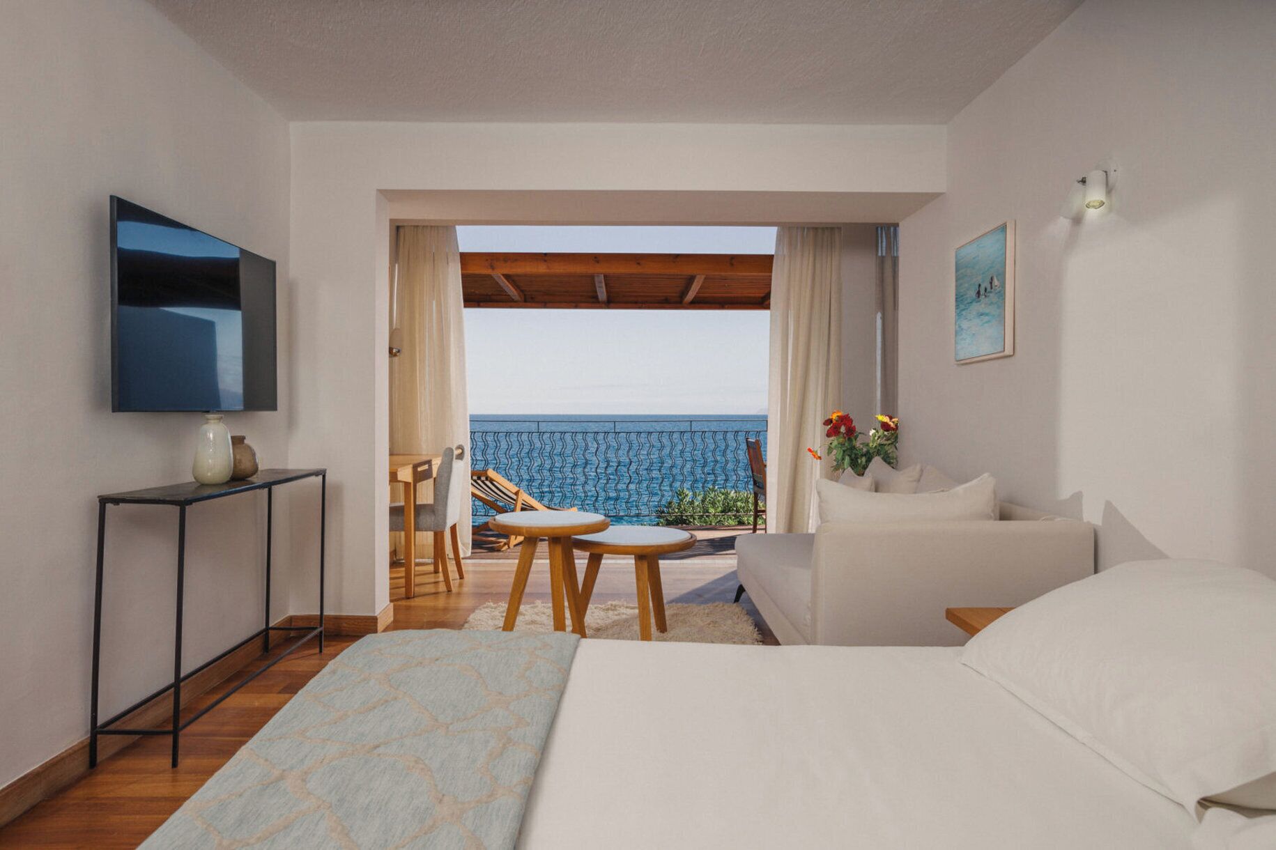 club junior suite (seafront view) | premium bedding, down duvets, minibar, in-room safe
