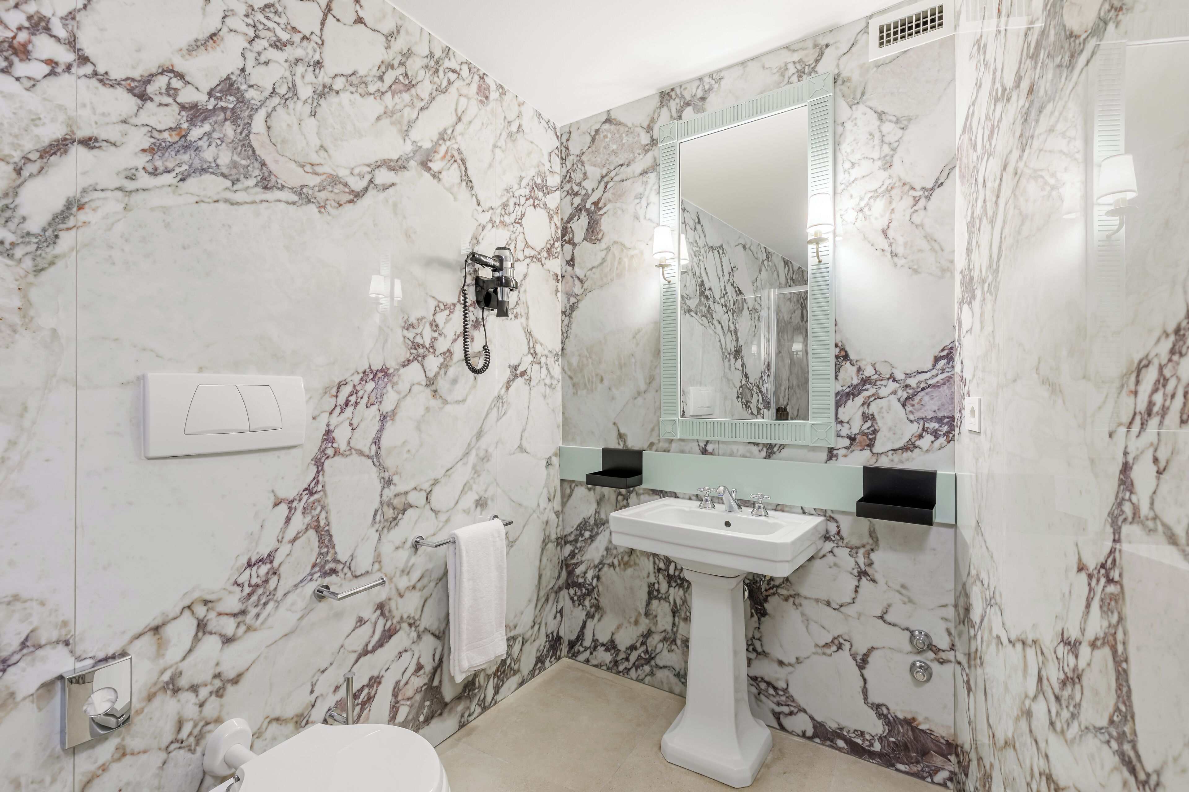 eco-friendly toiletries, hair dryer, bidet, towels