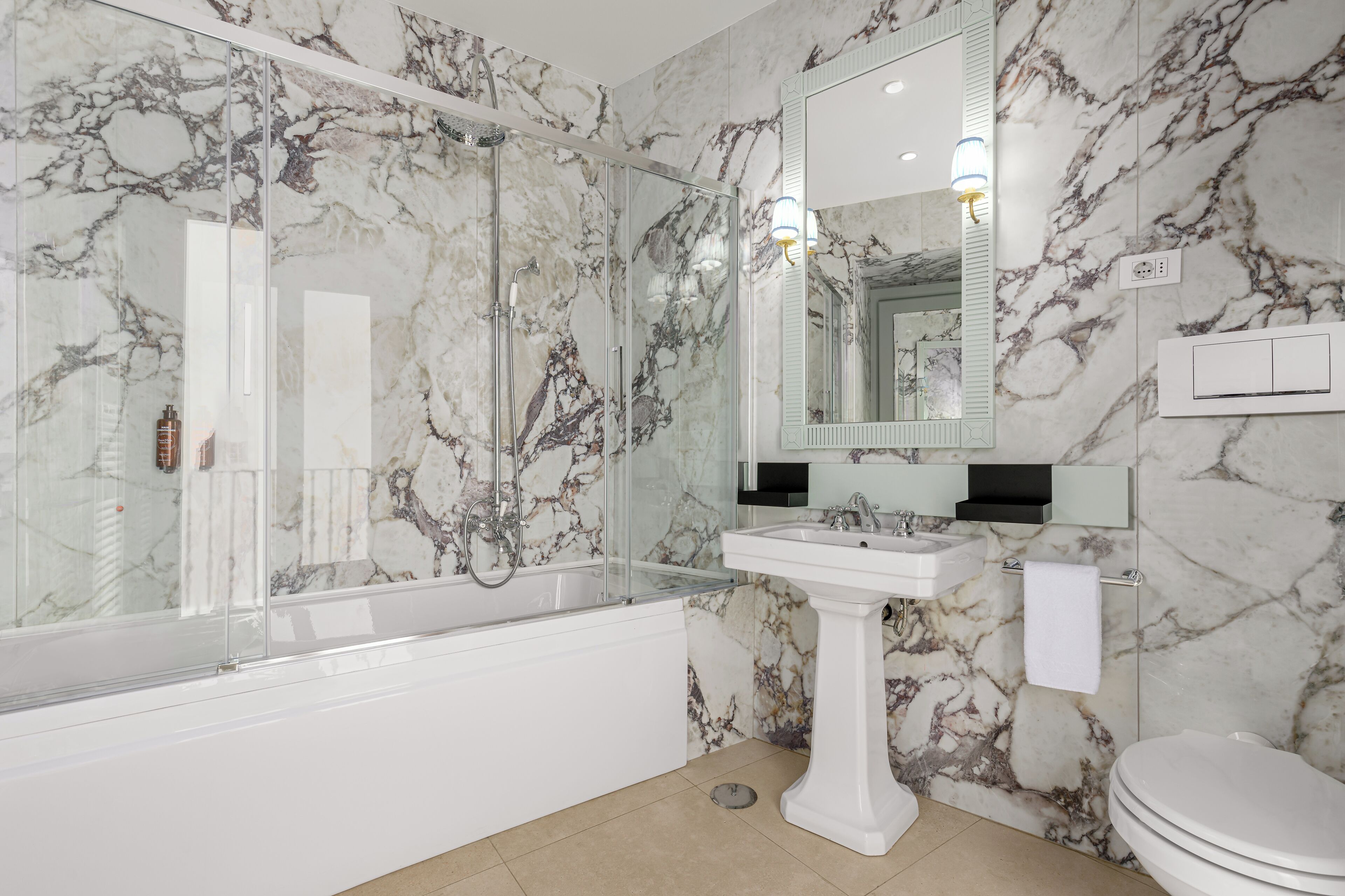 deluxe double room | bathroom | eco-friendly toiletries, hair dryer, bidet, towels