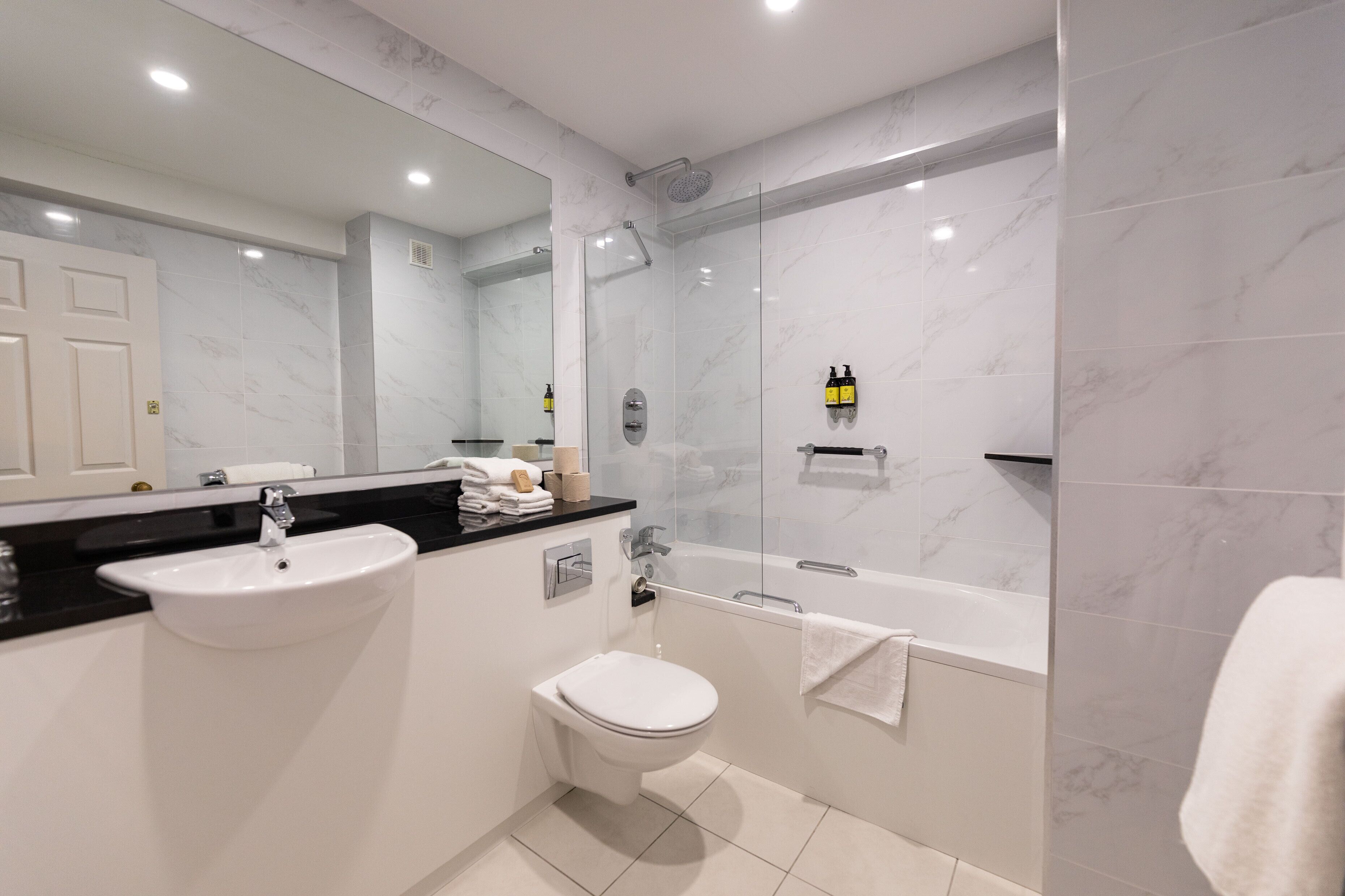 twin room | bathroom | eco-friendly toiletries, hair dryer, towels