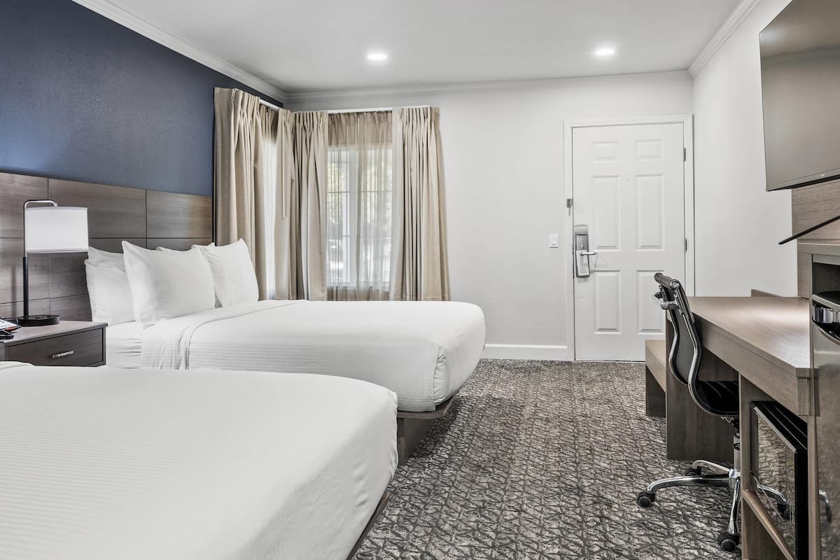 Standard Room, 2 Queen Beds, Non Smoking | Down duvets, desk, laptop workspace, iron/ironing board