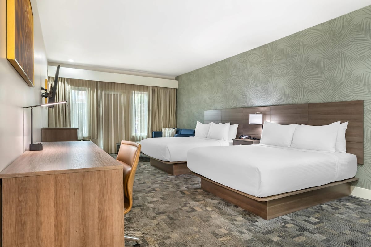 Suite, Multiple Beds, Non Smoking | Down comforters, desk, laptop workspace, iron/ironing board