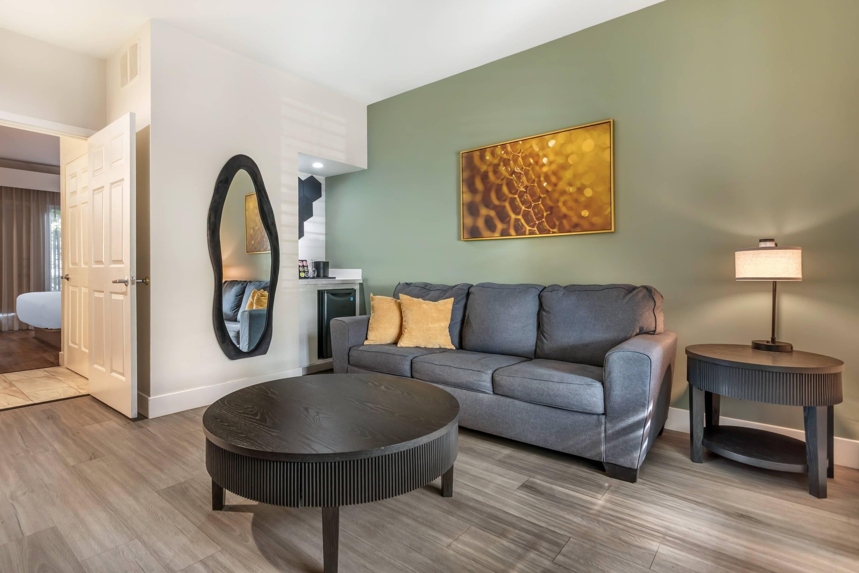 Suite, 1 King Bed with Sofa bed, Non Smoking | Down comforters, desk, laptop workspace, iron/ironing board