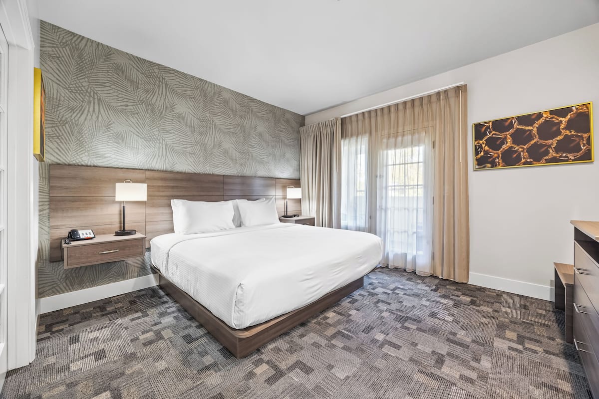 Down duvets, desk, laptop workspace, iron/ironing board