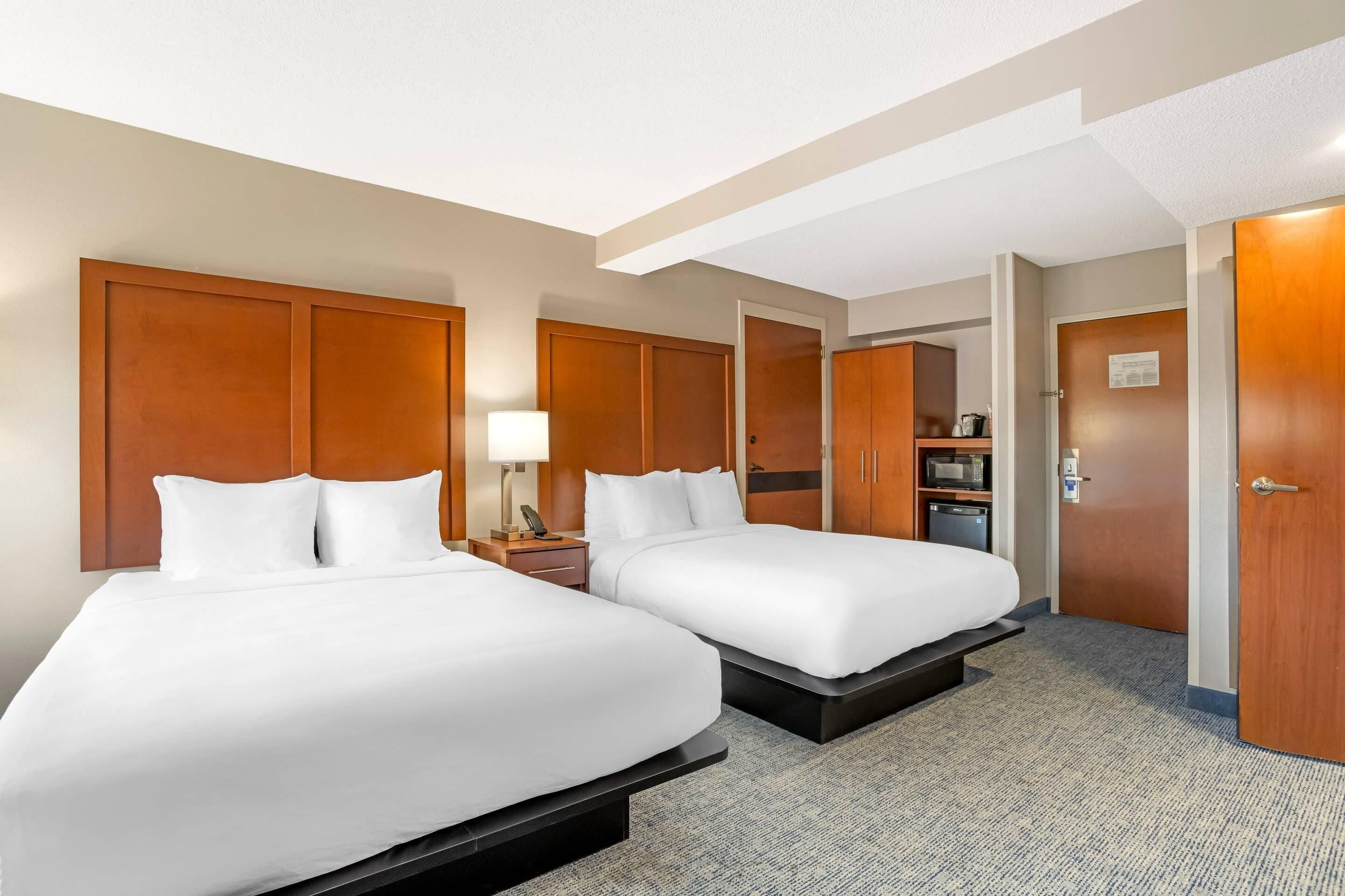 suite, non smoking (2 queen beds with sofabed) | desk, laptop workspace, blackout curtains, soundproofing