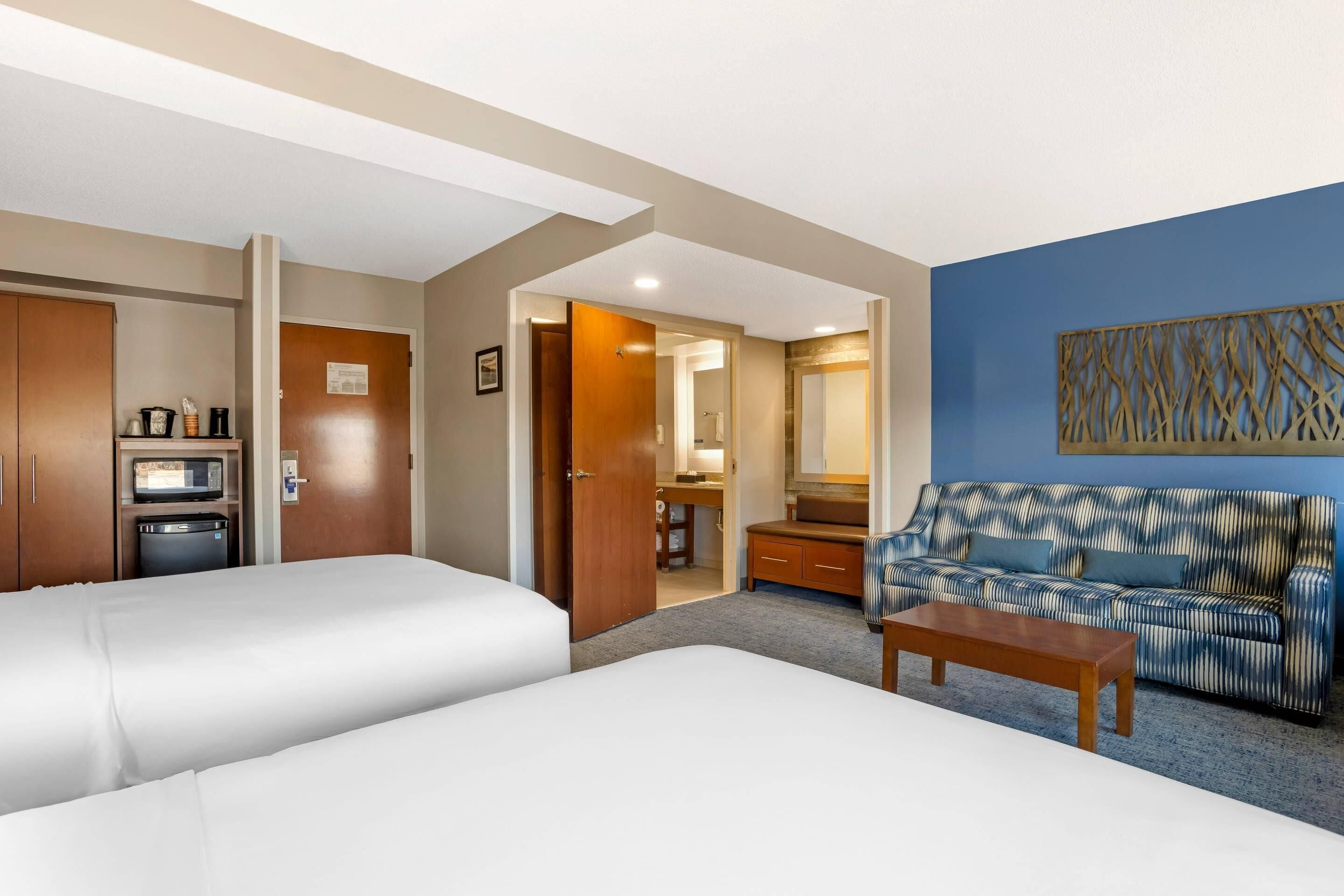 suite, non smoking (2 queen beds with sofabed) | desk, laptop workspace, blackout curtains, soundproofing