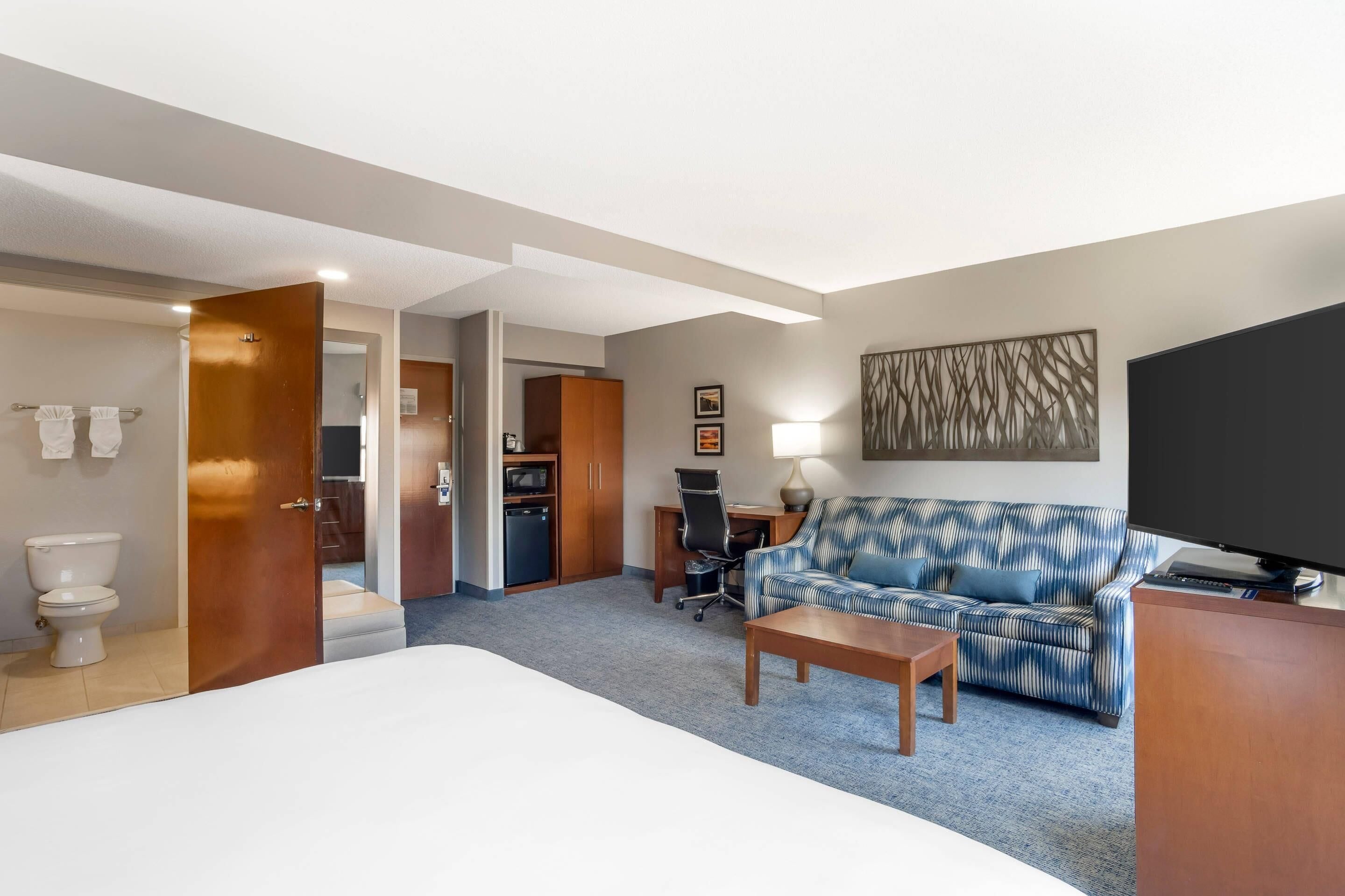 suite, 1 king bed with sofa bed, non smoking | desk, laptop workspace, blackout curtains, soundproofing