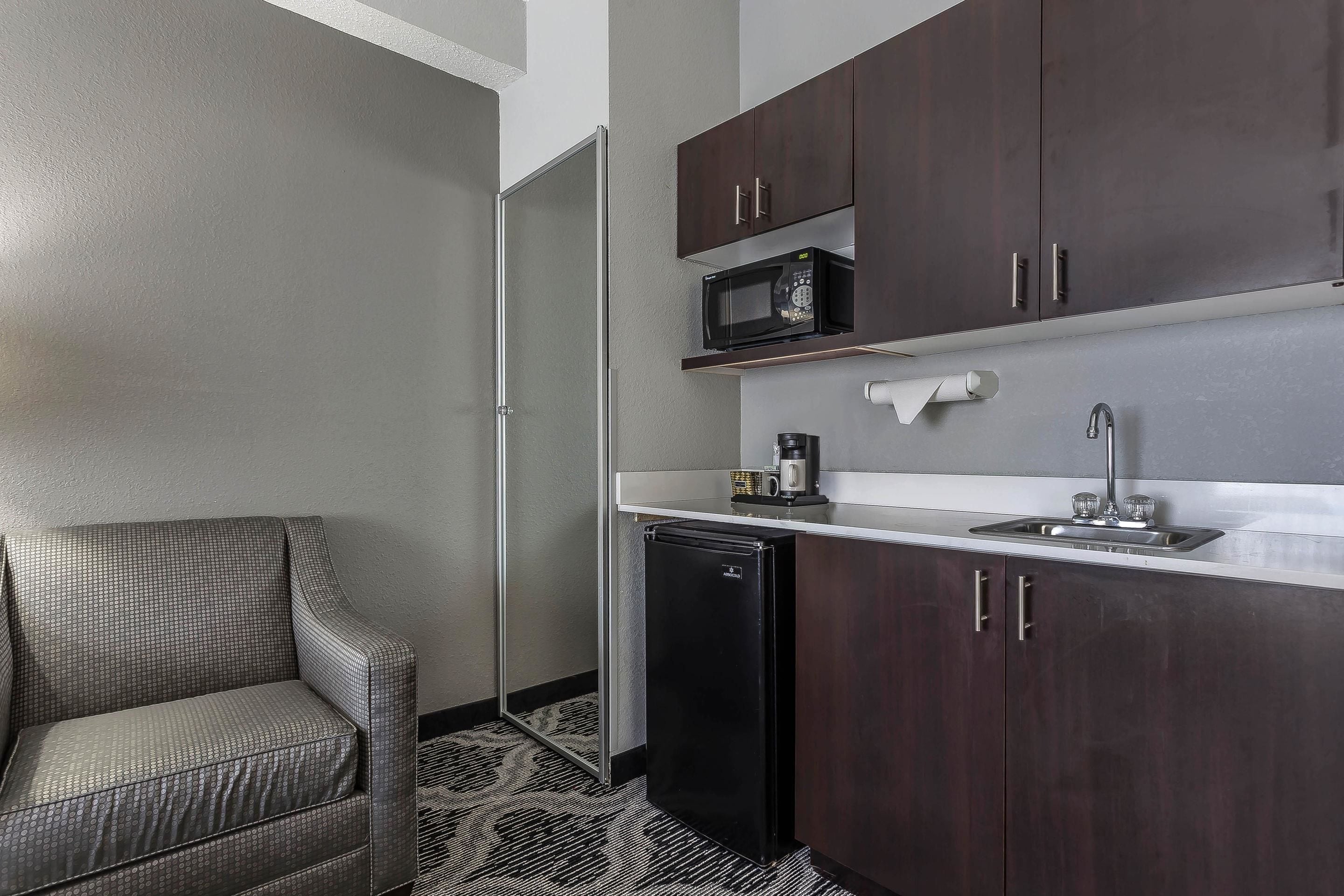 desk, laptop workspace, blackout curtains, iron/ironing board