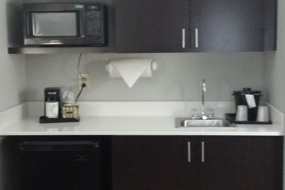 Fridge, microwave, coffee/tea maker, paper towels