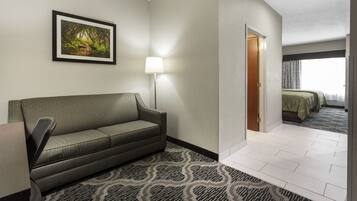 Desk, laptop workspace, blackout drapes, iron/ironing board