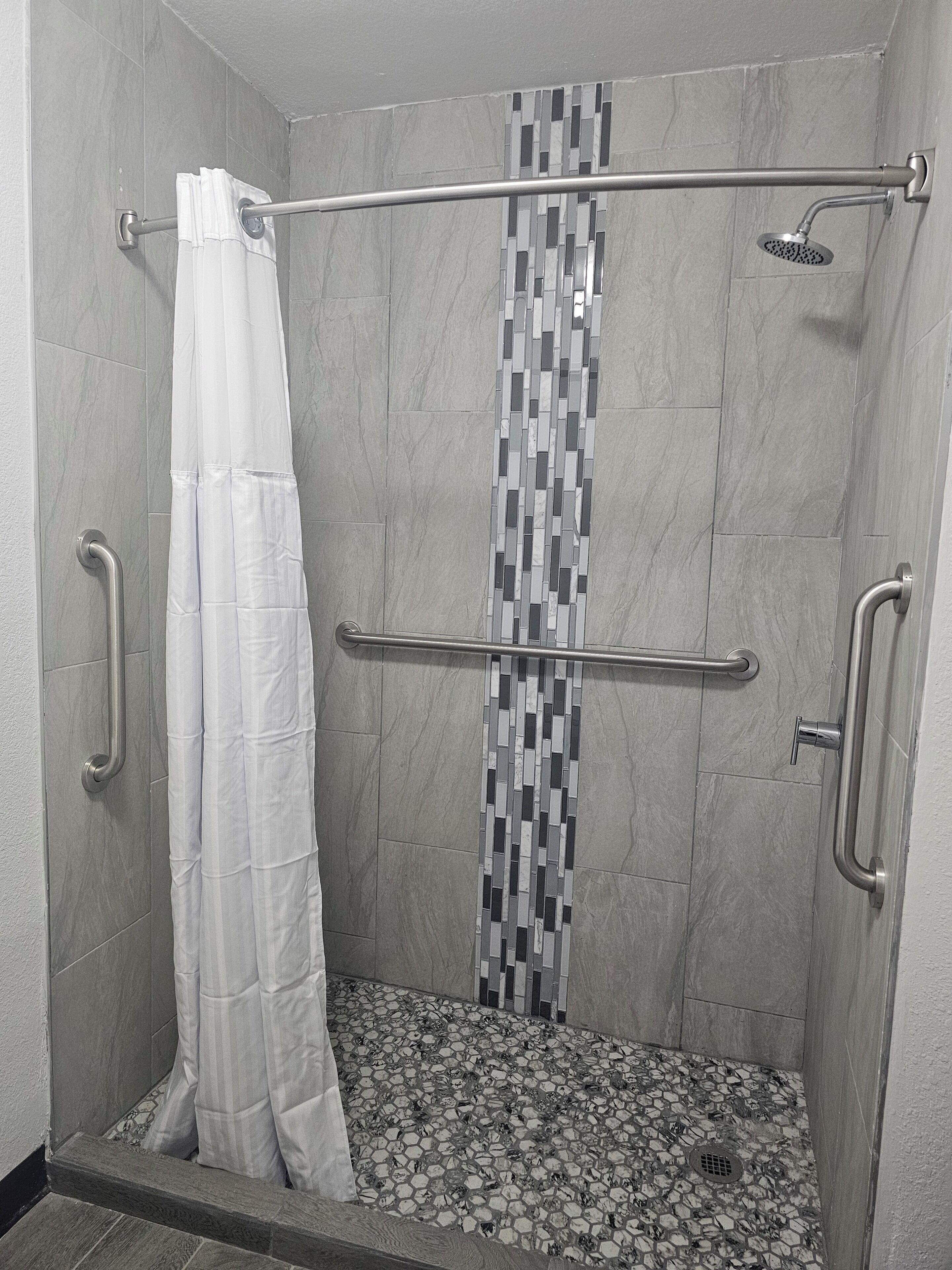 Room, 1 King Bed, Mobility Accessible, Non Smoking (Roll-in Shower) | Bathroom | Combined shower/tub, free toiletries, hair dryer, towels