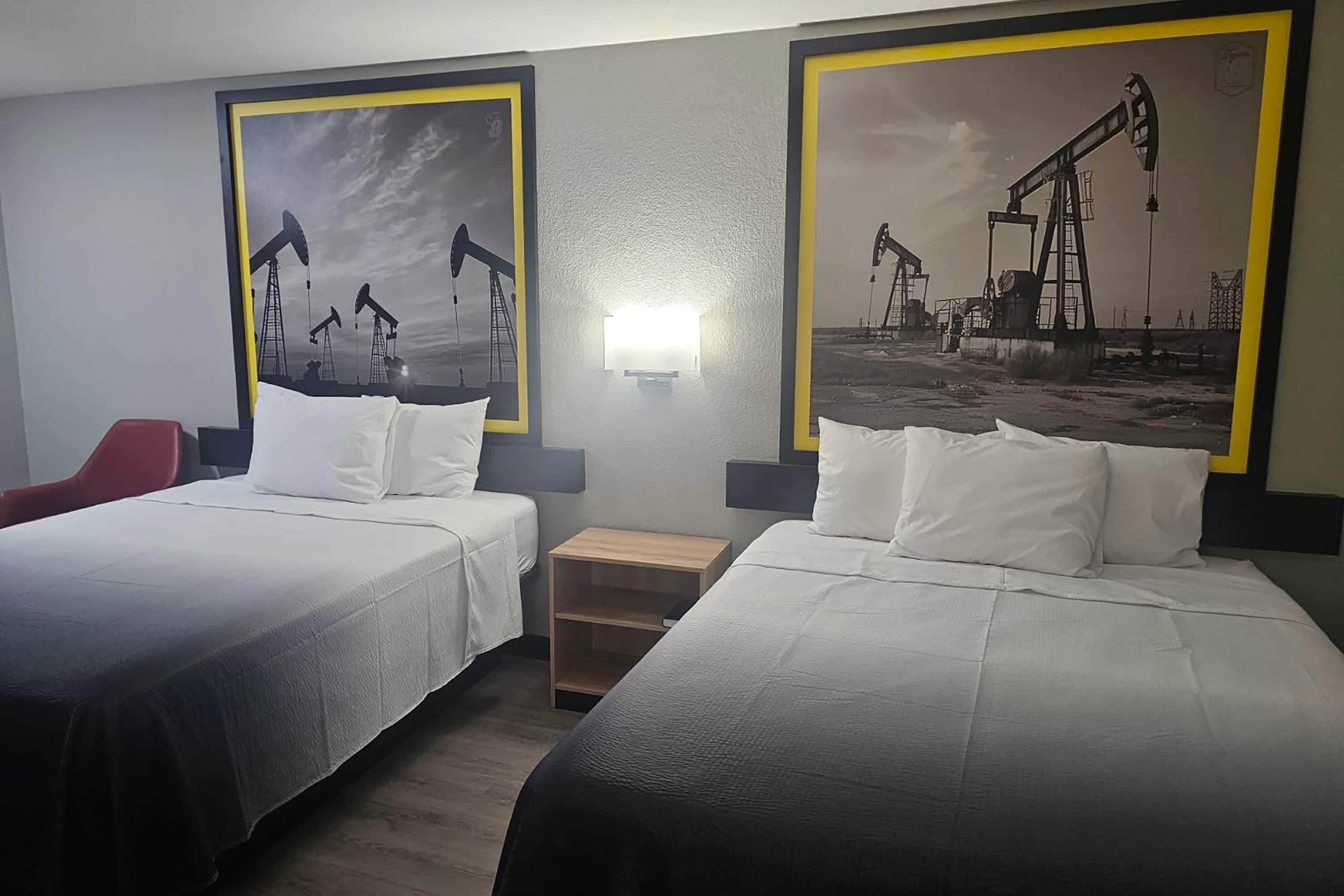 Room, 2 Queen Beds, Non Smoking | Blackout drapes, iron/ironing board, free WiFi, bed sheets