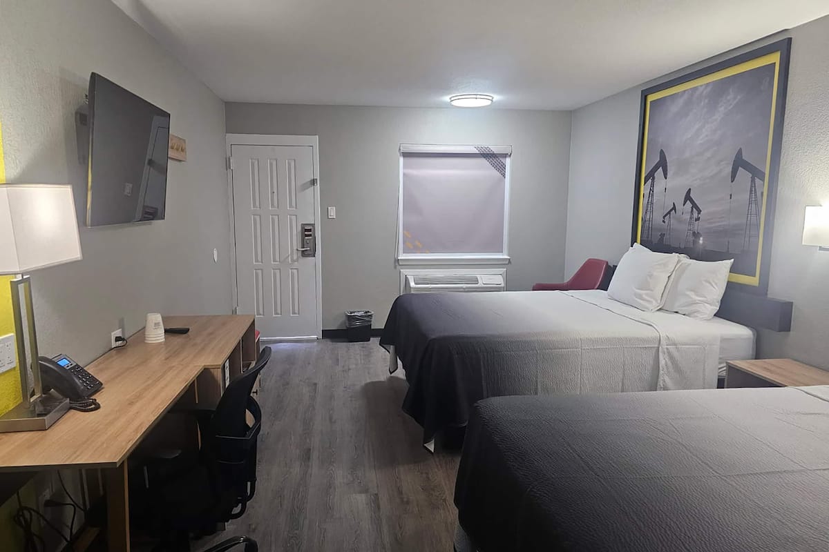 Room, 2 Queen Beds, Non Smoking | Blackout drapes, iron/ironing board, free WiFi, bed sheets